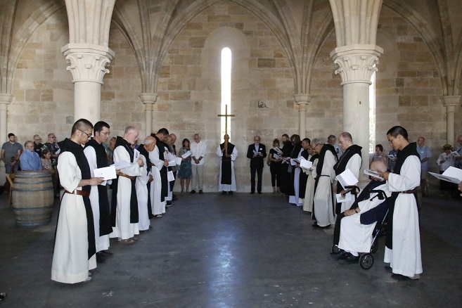 A donor event with the monks reading in prayer at the Abbey