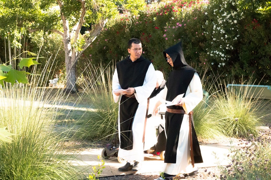Monks walking the grounds at the Abbey of Our Lady of New Clairvaux in Vina, CA